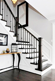 Brown and white staircase with aluminum baluster