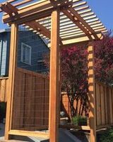 A arbor with Wild Hog panels on the side.