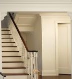 Vintage Victorian staircase with door casing, crown moulding and corbels